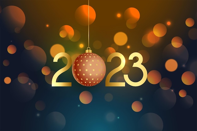 Panfleto de ano novo de 2023 com bola de natal em bokeh de fundo