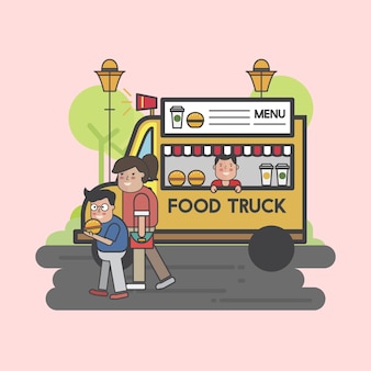 Pessoas felizes em um caminhão de comida