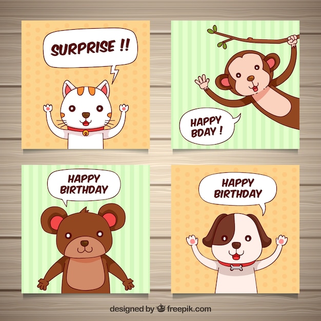 Quatro cartões de aniversário desenhados à mão com animais