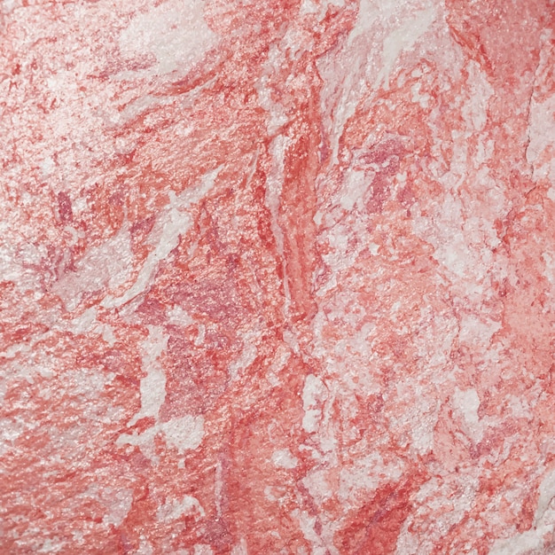 Textura de parede rosa aproximadamente pintada