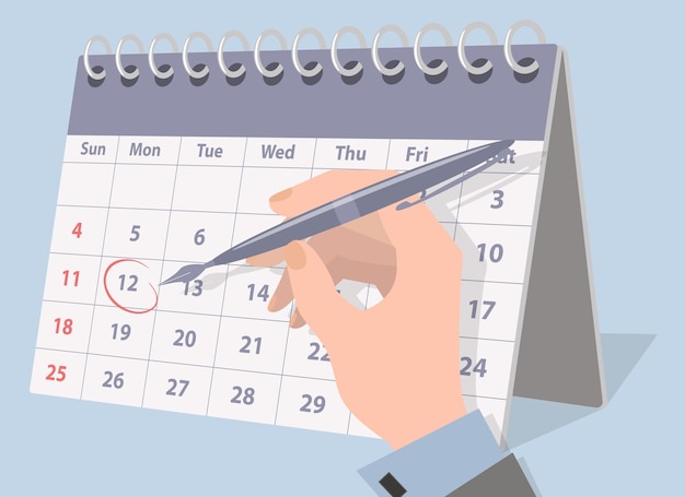 A mão de um empresário fazendo anotações no calendárioDeadline e agendamento de tarefas