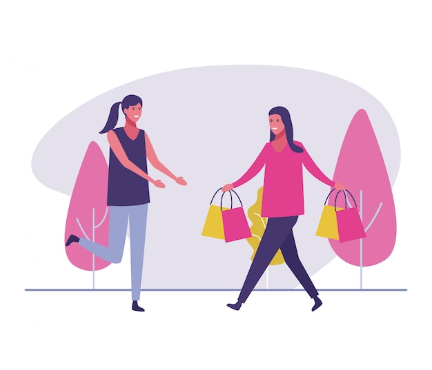 Amigos do sexo feminino compras ao ar livre