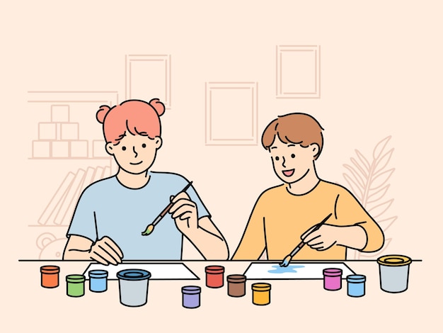 As crianças sentam-se à mesa fazendo desenhos de criatividade conjunta usando aquarela ou guache