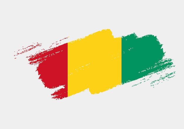 Bandeira artística da escova do grunge da Guiné isolada no fundo branco