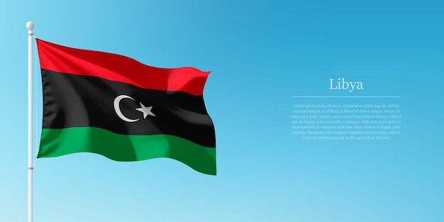 Bandeira da Líbia agitando contra o céu azul claro Copyspace