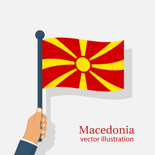 Bandeira da macedônia segurando na mão dia da independência da macedônia 8 de setembro ilustração vetorial design plano isolado no fundo brancoxA