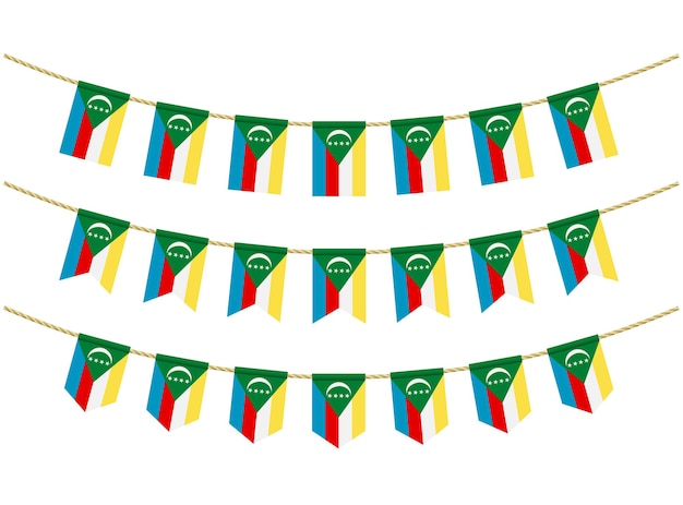 Bandeira de comores nas cordas em fundo branco. conjunto de sinalizadores de estamenha patriótica. decoração de estamenha da bandeira de comores