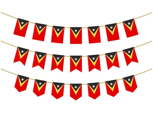 Bandeira de timor leste nas cordas em fundo branco. conjunto de sinalizadores de estamenha patriótica. decoração da bandeira do timor leste