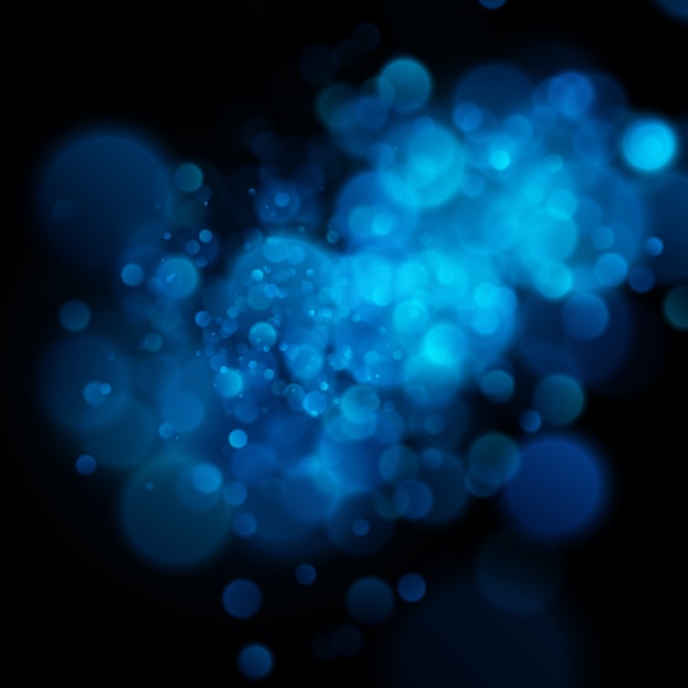 Bokeh azul circular defocused abstrato no fundo escuro.
