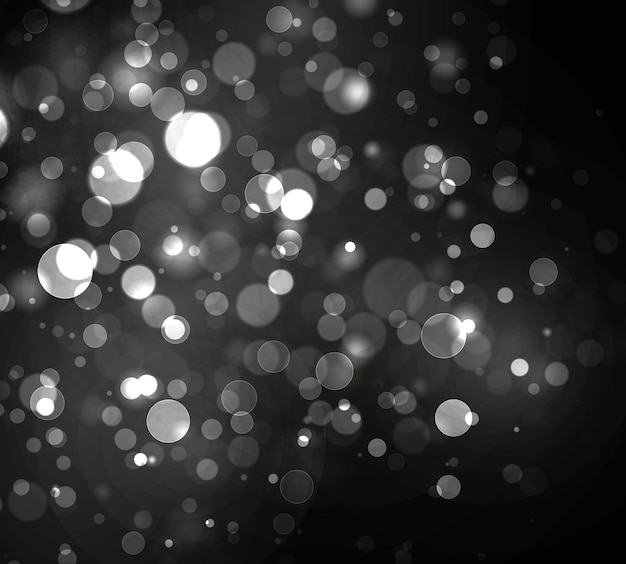 Bokeh turva luz sobre fundo preto. resumo glitter prata defocused piscando estrelas e faíscas.