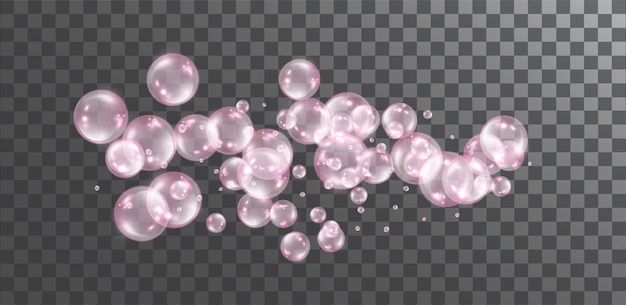 Bolhas de sabão voadoras transparentes cor-de-rosa no fundo transparente escuro