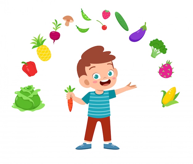 Bonito garoto feliz com legumes