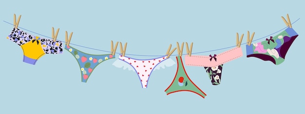 Calcinha feminina pendurada em uma corda. A cueca é seca após a lavagem. Várias opções de calcinha