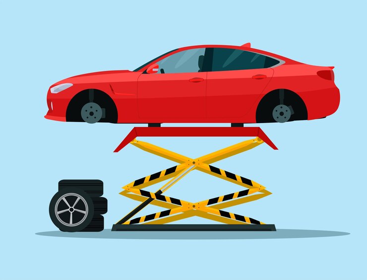Carro sedan erguido em um elevador para reparo.