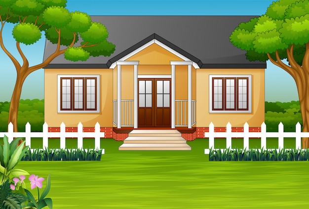 Vetor casa dos desenhos animados com quintal verde e cerca de madeira