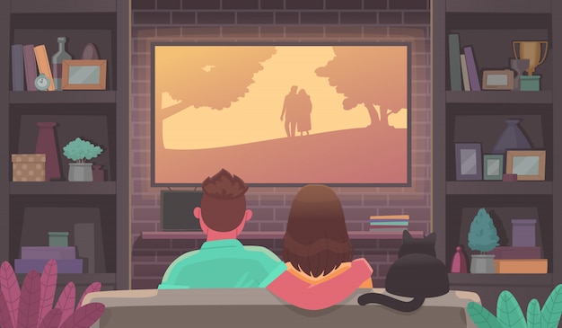 Casal de jovens assistindo tv. homem e mulher em um ambiente aconchegante assistem a um filme. ficar em casa. serviço de streaming de publicidade ou cinema online.