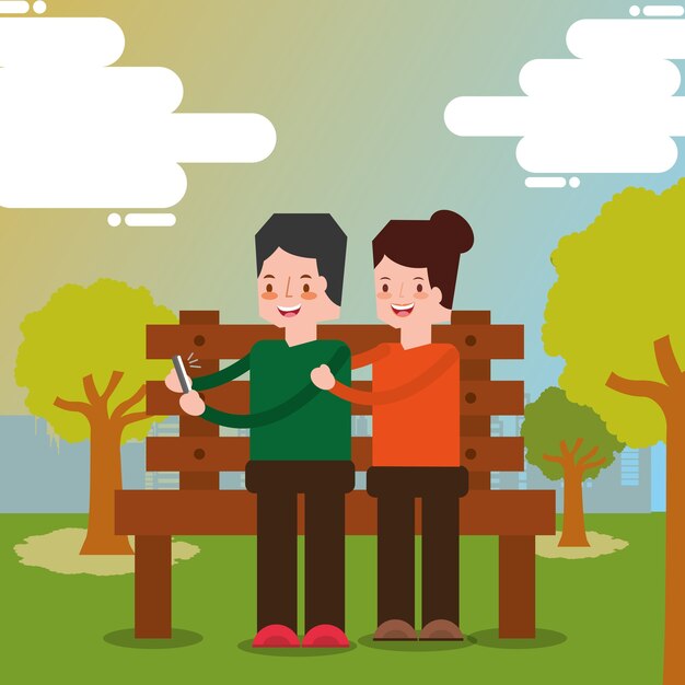 casal segurando smartphone sentado no banco no parque