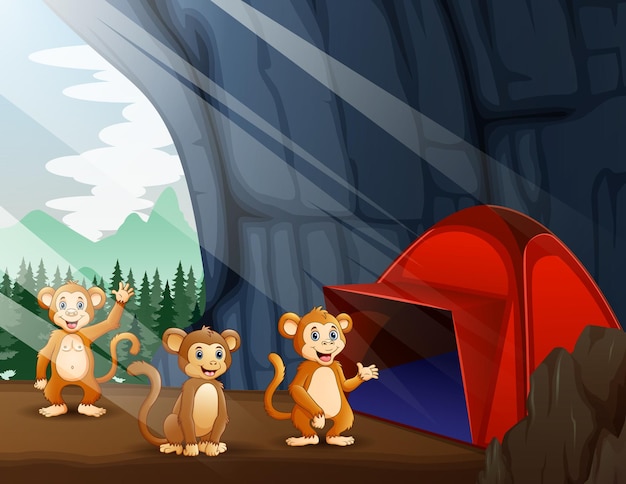 Cena com barraca de camping e três macacos