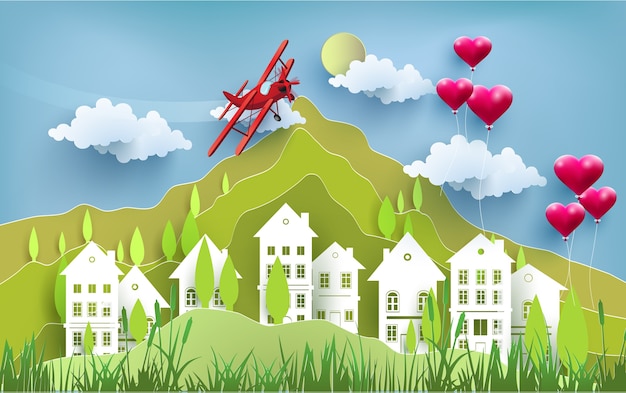 Cidade ecológica com balões de amor e avião pequeno