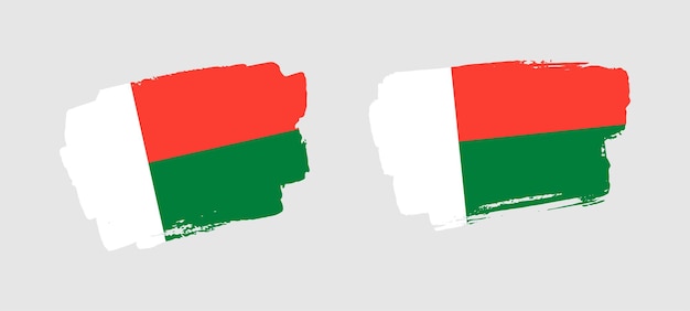 Conjunto de duas ilustrações de bandeira de pincel de madagascar pintadas à mão em fundo sólido