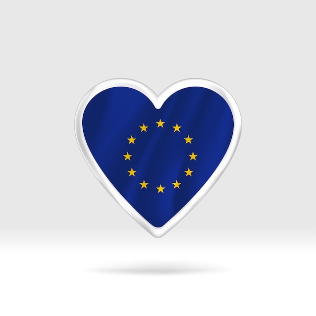 Coração da bandeira da União Europeia. Estrela de botão de prata e modelo de bandeira.