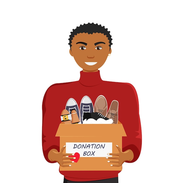 Doação de roupas Africano segurando a caixa de doação Minimalismo Estilo de vida Assistência Social e Caridade