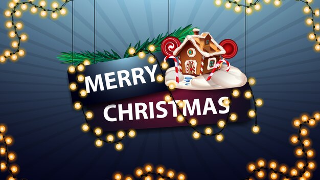 Feliz Natal, sinal embrulhado com uma guirlanda com galhos de árvores de Natal e casa de gengibre de Natal