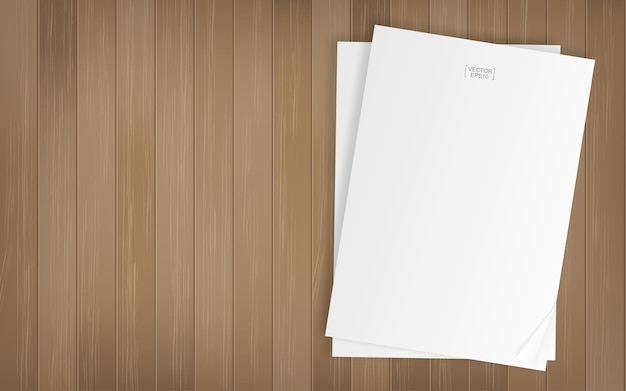 Folha de papel branco em fundo de textura de madeira
