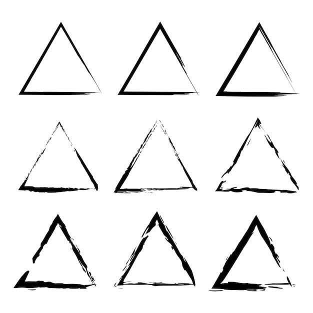 Fotografia de formas triangulares pretas desenhadas à mão sobre fundo branco