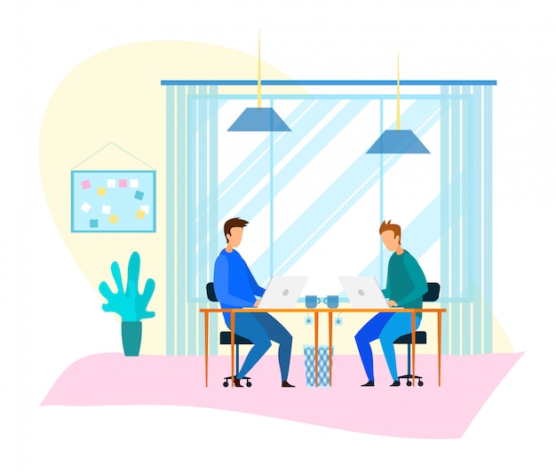 Freelancers trabalham no PC em um moderno escritório de coworking