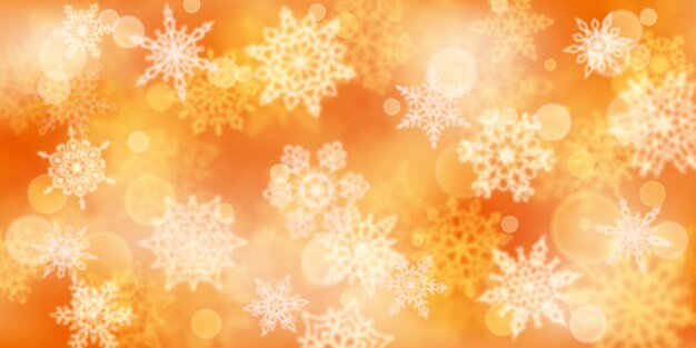 Fundo de Natal com flocos de neve desfocados em cores amarelas