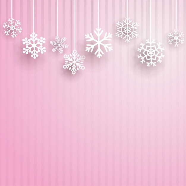 Fundo de Natal com vários flocos de neve pendurados em um fundo rosa listrado