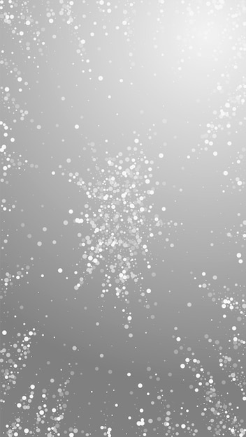 Fundo de natal de pontos brancos aleatórios. flocos de neve voando sutis e estrelas em fundo cinza. modelo de sobreposição de floco de neve de prata adorável inverno. ilustração vertical digna.
