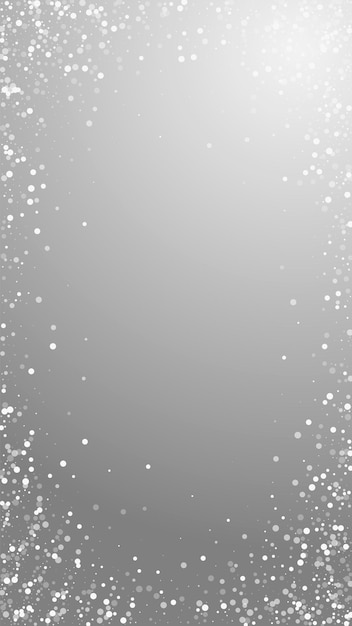Vetor fundo de natal de pontos brancos aleatórios. flocos de neve voando sutis e estrelas em fundo cinza. modelo de sobreposição de floco de neve de prata real inverno. ilustração vertical notável.