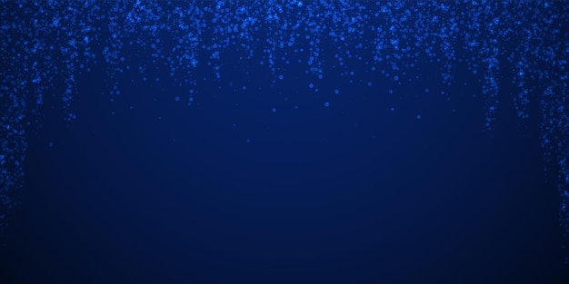 Vetor fundo de natal esparso de estrelas mágicas. flocos de neve voando sutis e estrelas sobre fundo azul escuro à noite. modelo de sobreposição de floco de neve prata inverno atraente. esplêndida ilustração vetorial.