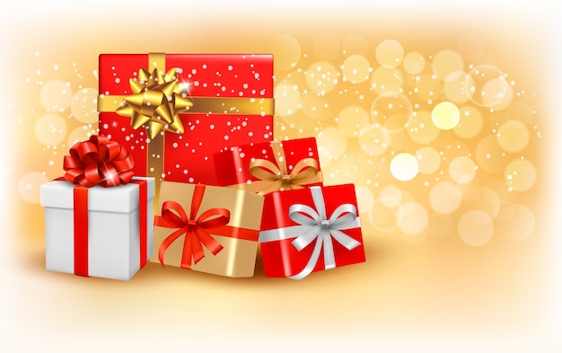 Fundo de ouro de Natal com caixa de presente e floco de neve.