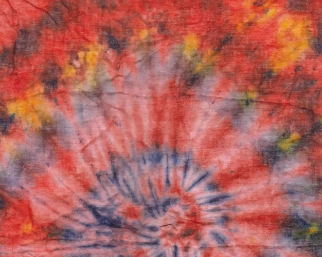Fundo de padrão tie-dye espiral laranja pintado à mão colorido