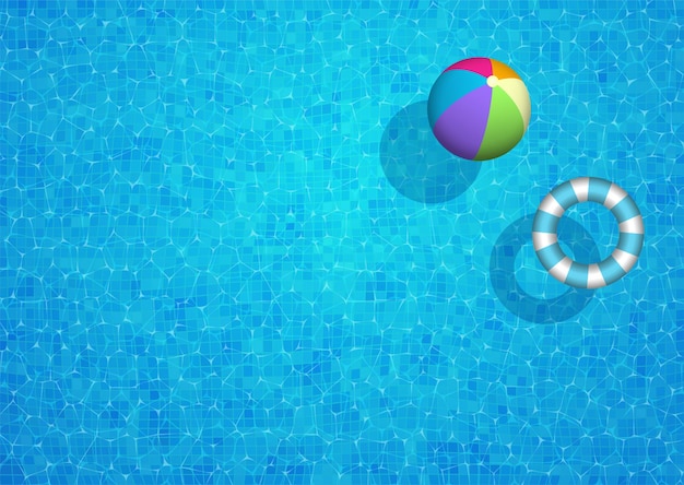 Fundo de piscina com bola de praia e anel de borracha