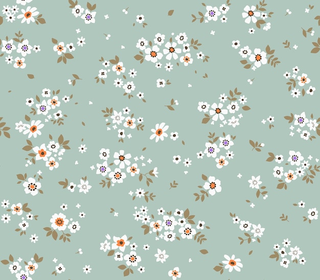 Fundo floral vintage padrão de vetor sem costura com flores pequenas em um fundo azul claro