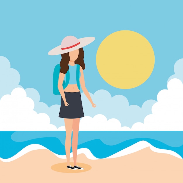 Garota de turista com chapéu de verão na praia