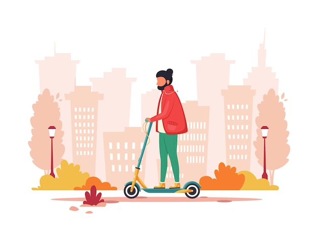 Homem andando de scooter elétrico no outono. conceito de transporte ecológico.
