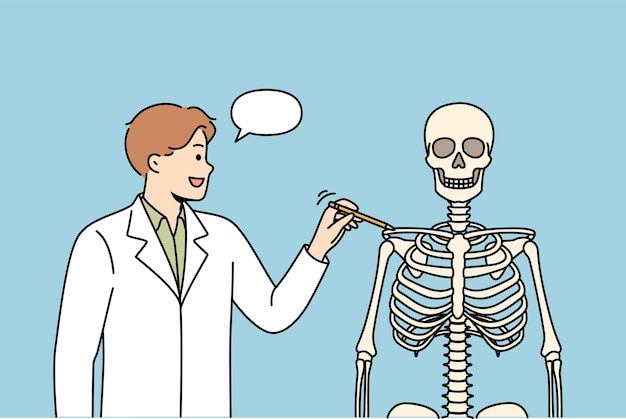 Homem professor de faculdade de medicina fala sobre a estrutura do esqueleto humano e ensina futuros médicos