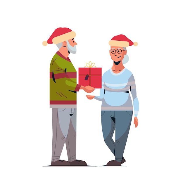 Vetor homem sênior com chapéu de papai noel dando uma caixa de presente para a família de uma mulher madura celebrando o feliz natal feliz ano novo ilustração do conceito de férias de inverno