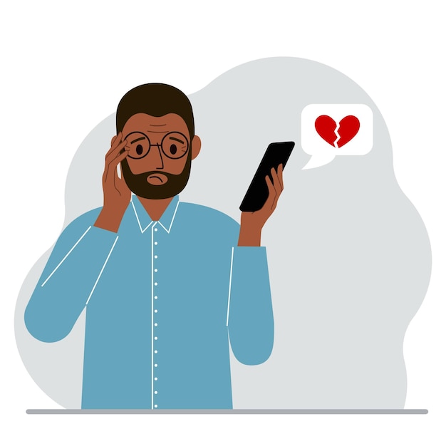 Homem triste lendo uma mensagem em seu celular Mensagem com um coração vermelho partido Vetor grátis