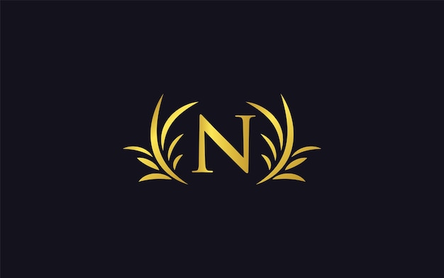 Letra n do elegante logotipo dourado