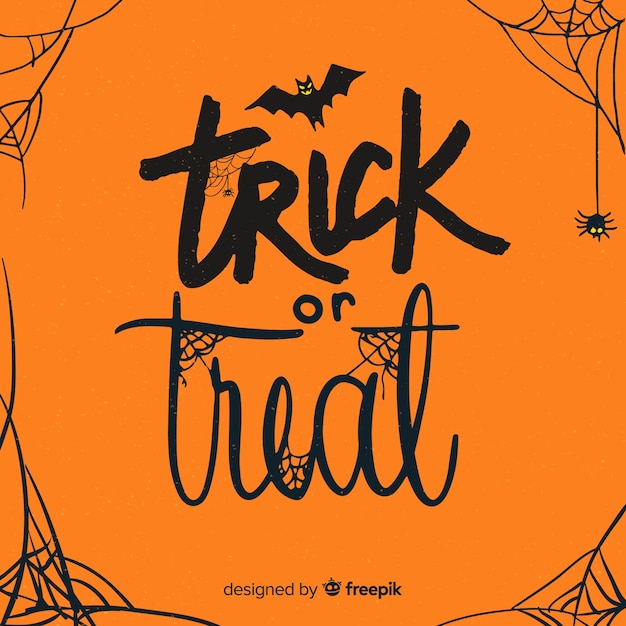 Letras de halloween em tons de laranja com teias de aranha