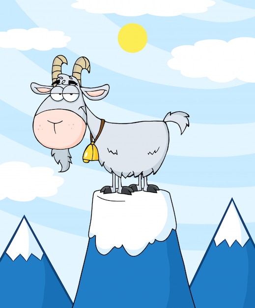 Longhorn de cabra no topo de um pico de montanha