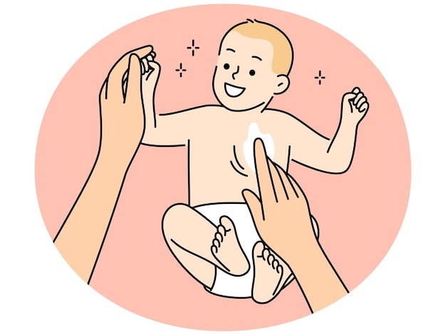 Mãe aplica creme no recém-nascido