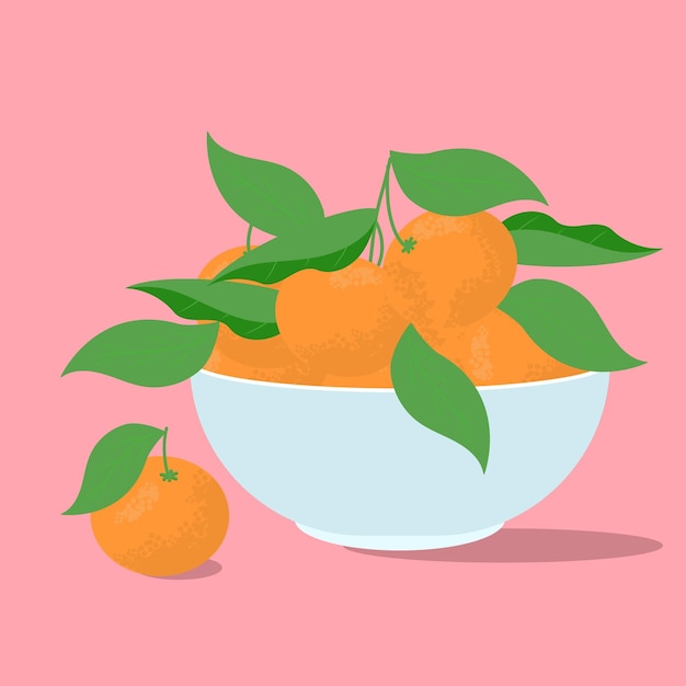 Mandarinas com folhas em uma tigela em um fundo rosa