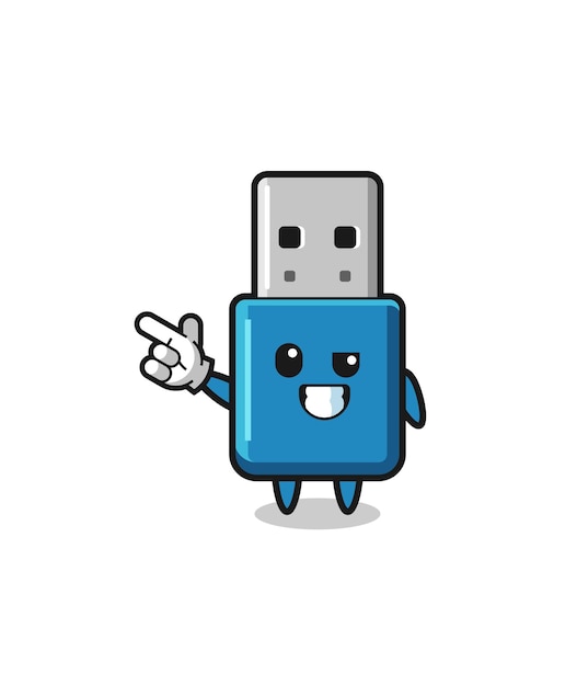 Mascote usb da unidade flash apontando para o canto superior esquerdo